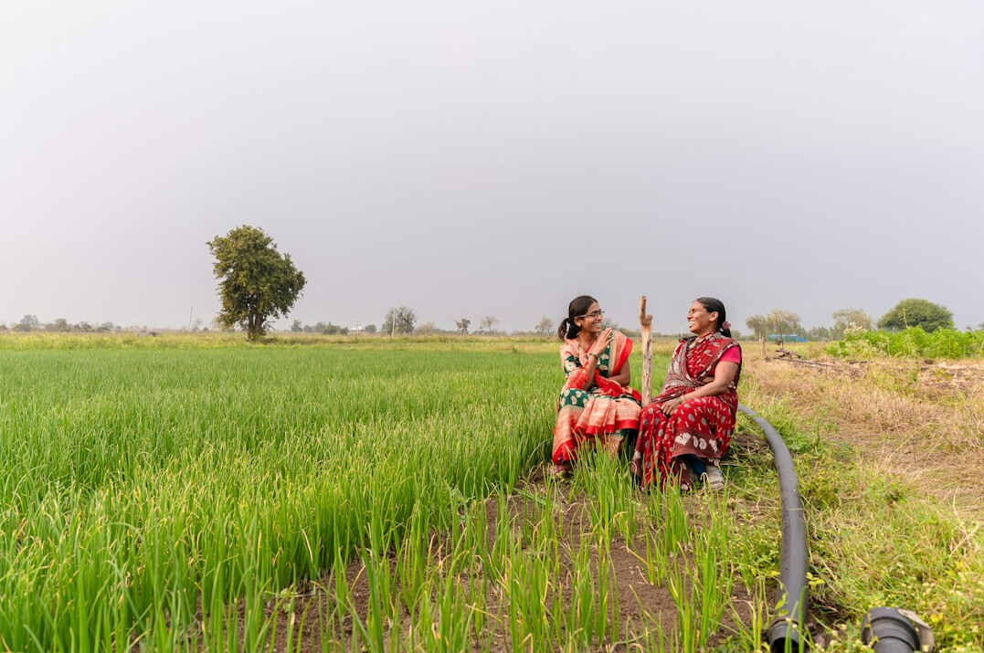 woman sharing story in village