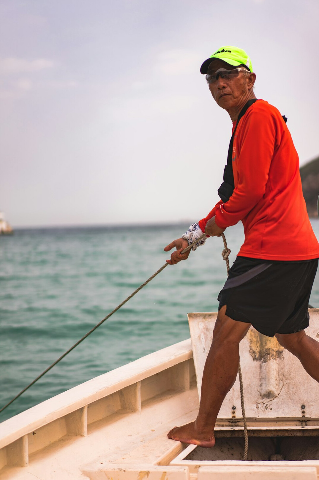 elderly fisherman on boat